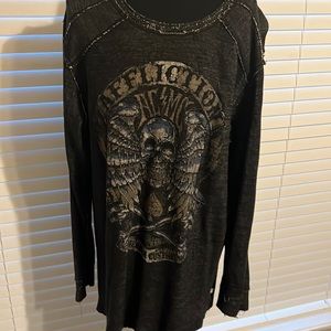 This is a special edition affliction reversible xl men’s shirt